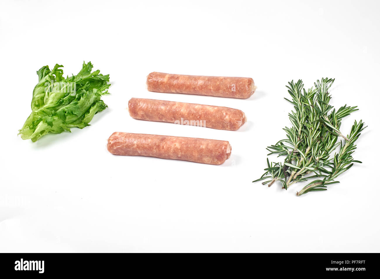 Raw meat sausages isolated on white background Stock Photo