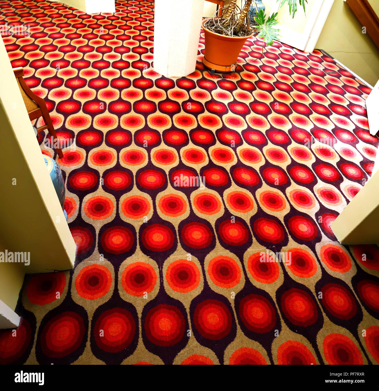 Crazy 1960's carpet in an old foyer. Stock Photo