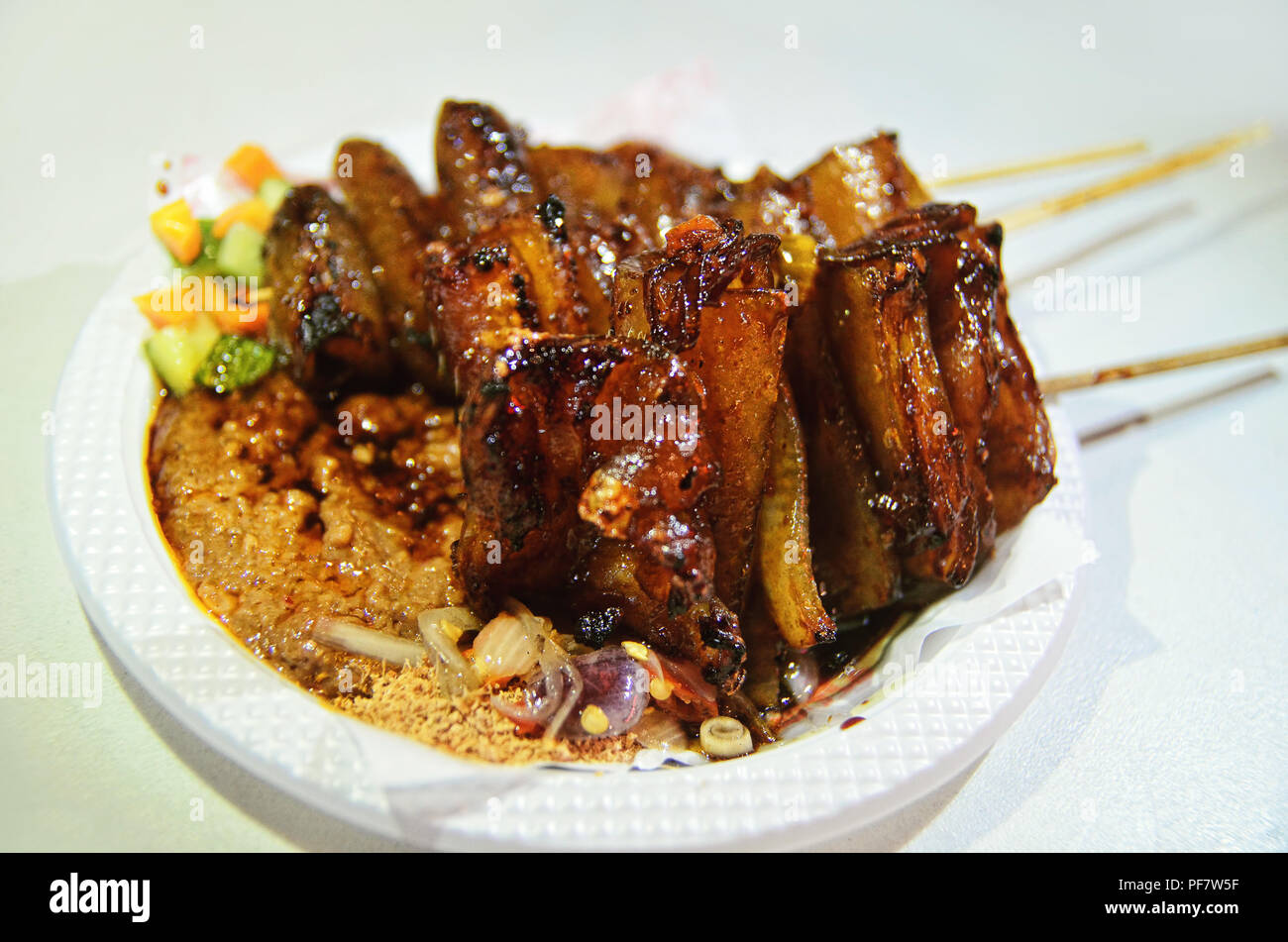 A portion of pork skin satay (sate kulit babi) Stock Photo