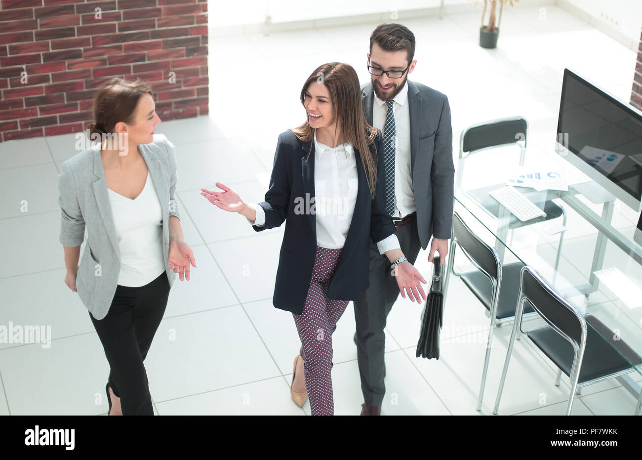 business people standing in a modern office Stock Photo - Alamy