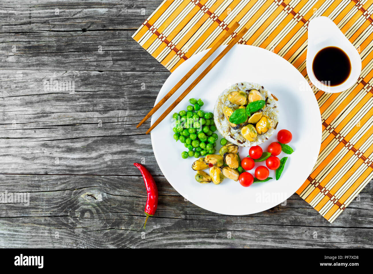 marinated mussels with brown and wild rice, top view Stock Photo - Alamy