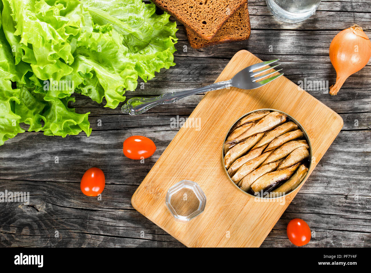 Tin can with smoked Baltic sprats, sardines, closeup Stock Photo Alamy