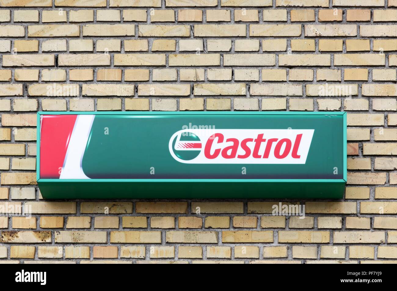 Tilst, Denmark - May 10, 2018: Castrol logo on a wall. Castrol is a British global brand of industrial and automotive lubricants Stock Photo