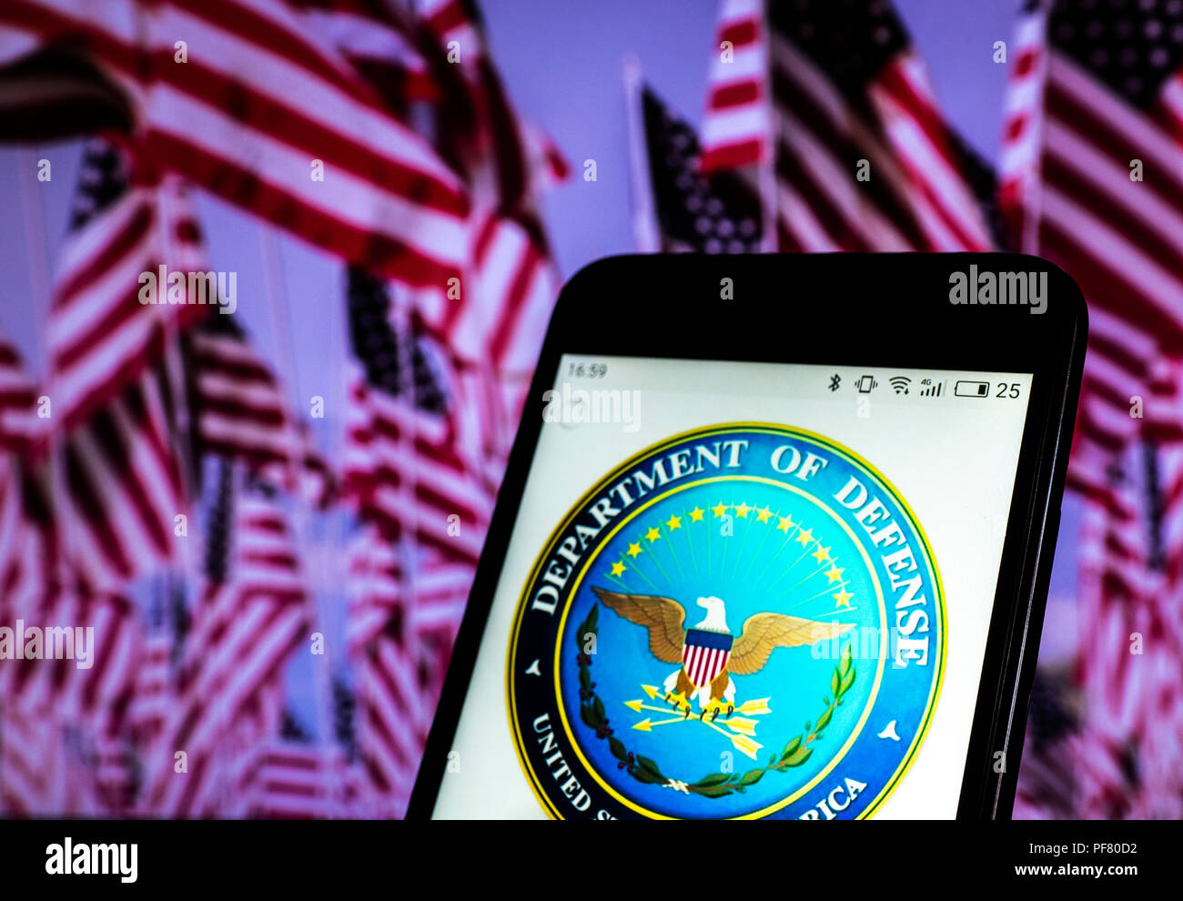 Seal of United States Department of Defense seen displayed on a smart phone. Stock Photo