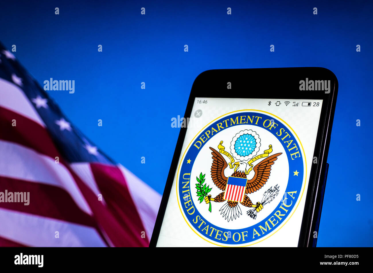 Seal of United States Department of State seen displayed on a smart phone. Stock Photo