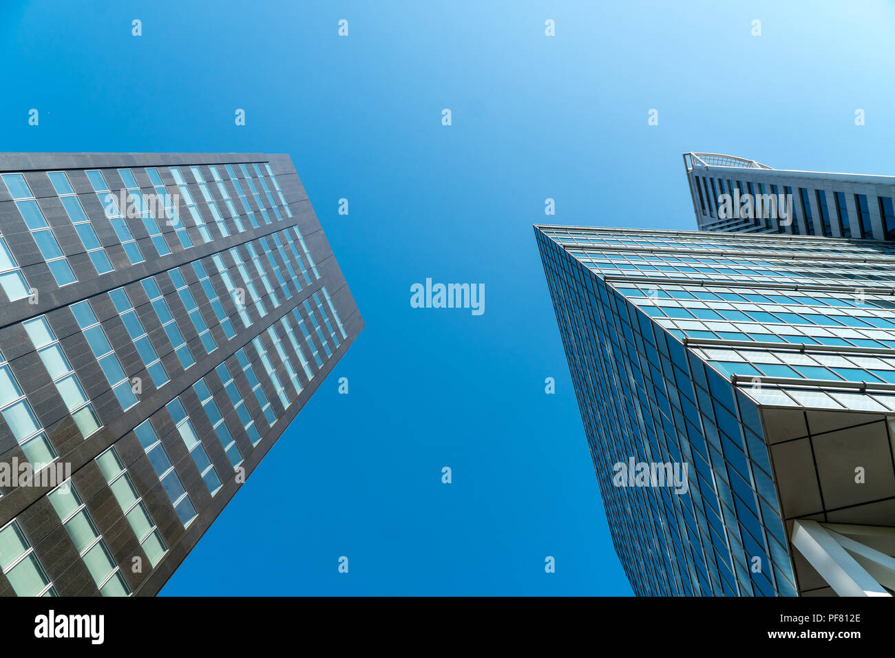 Skyscrapers in the blue sky Stock Photo - Alamy
