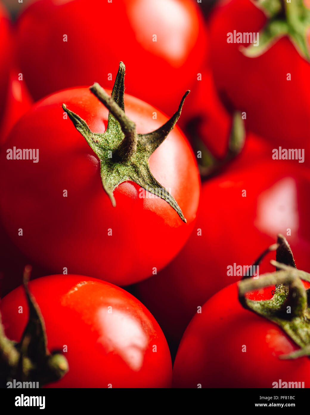 Backdrop of Ripe and Red Cherry Tomatoes. Vertical Orientation Stock ...