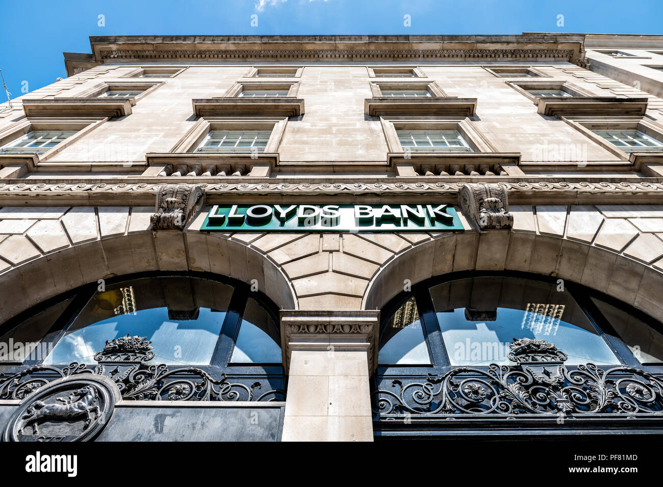 London, UK - June 22, 2018: Low angle, looking up view on Lloyds Bank sign, branch, office in city Stock Photo