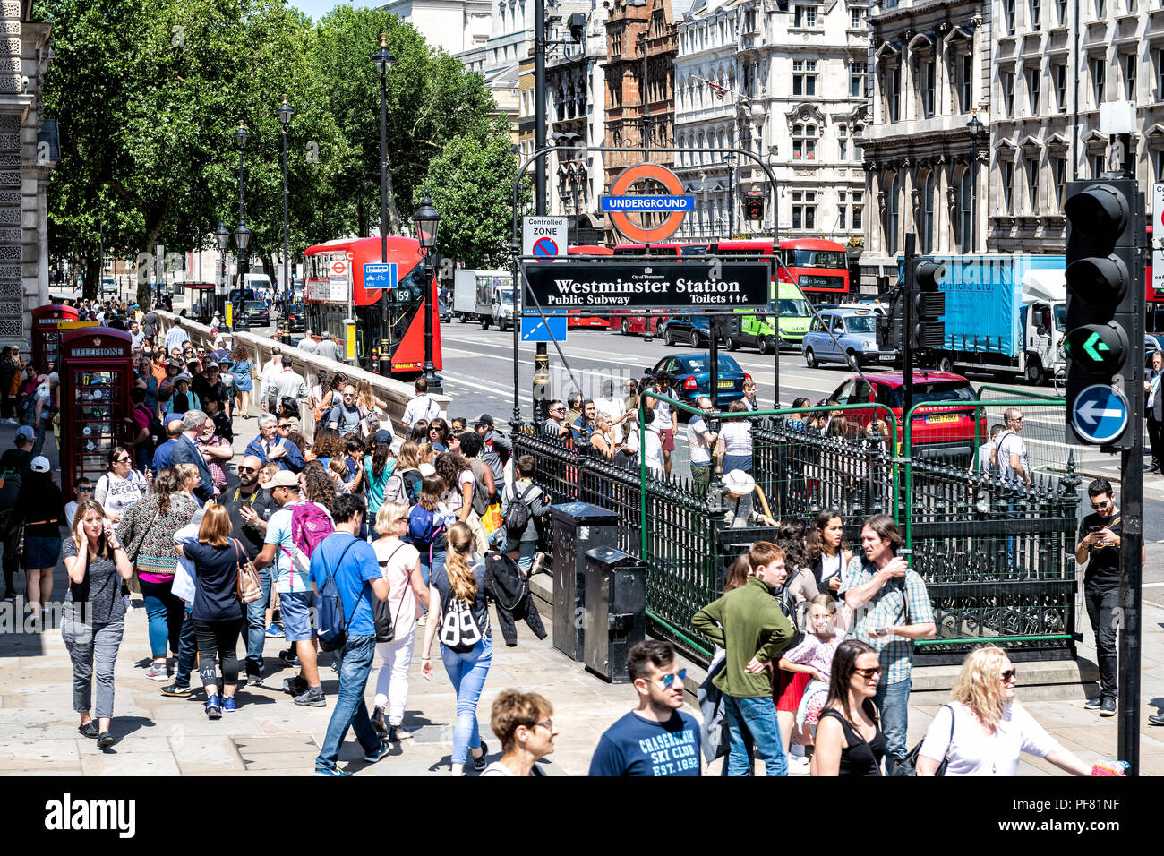 London, UK - June 22, 2018: Westminster station entrance, exit at Great George Street with many people walking, crowd, crowded road Stock Photo
