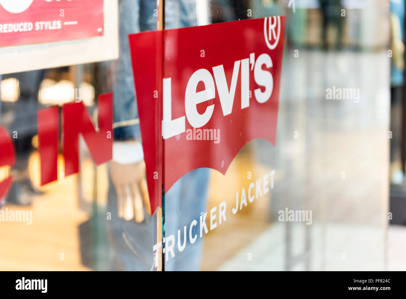 Tysons Corner, USA - January 26, 2018: Closeup of Levi's, Levis jeans denim  store, shop with trucker jacket sign on glass window, door entrance with n  Stock Photo - Alamy