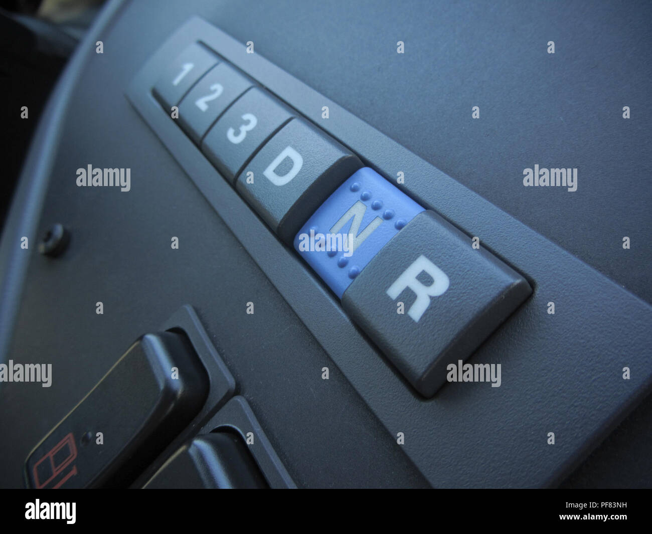 Focus on an automatic transmission pannel inside a bus Stock Photo