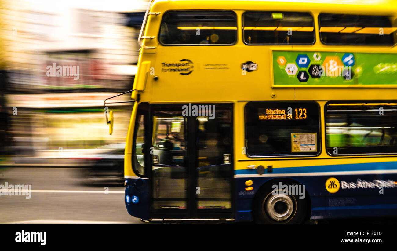 Motion blur of double decker bus speeding down the streets Dublin ...