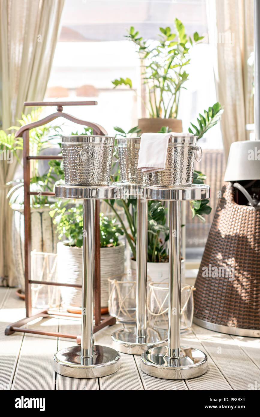 Metal buckets with an ice for cooling drinks. Service area the waiter ...