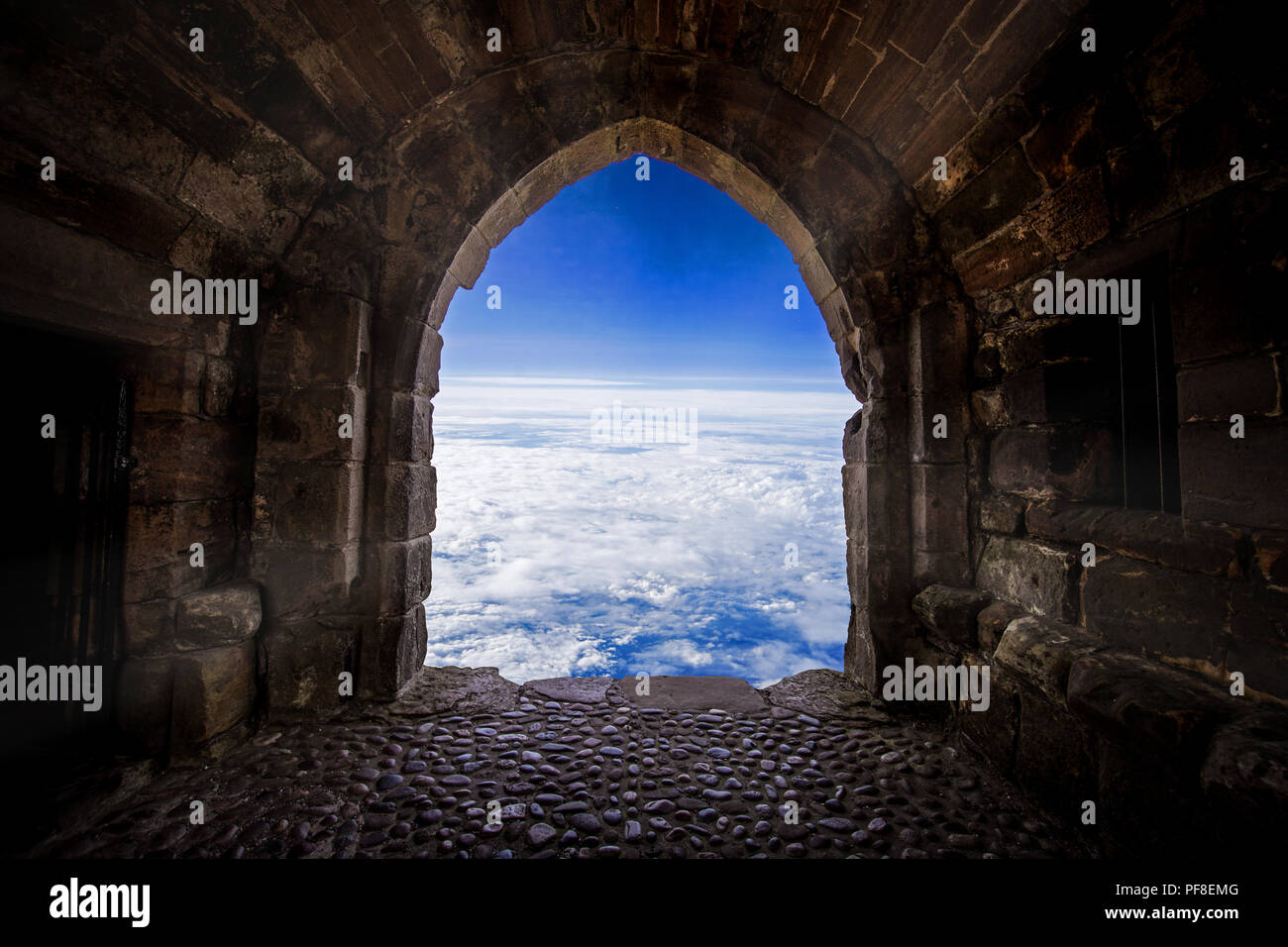 The door open to the world from old place or cave.Let us explore the world, Taking risk, open your vision, get out of cormfort zone concepts. Stock Ph Stock Photo