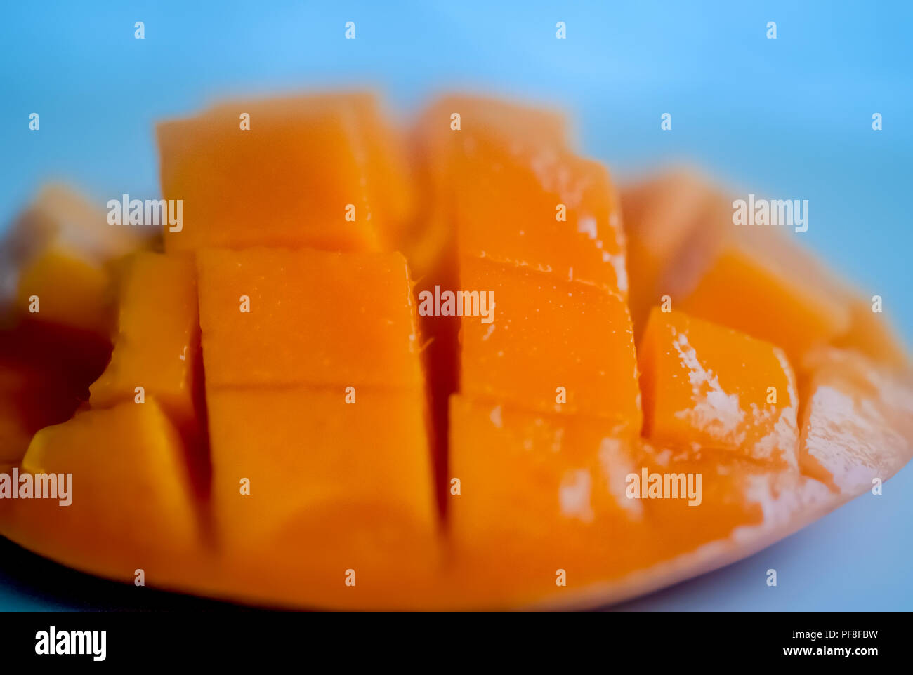 Ready to eat, cut, Flat lay mango tropical fruit Stock Photo
