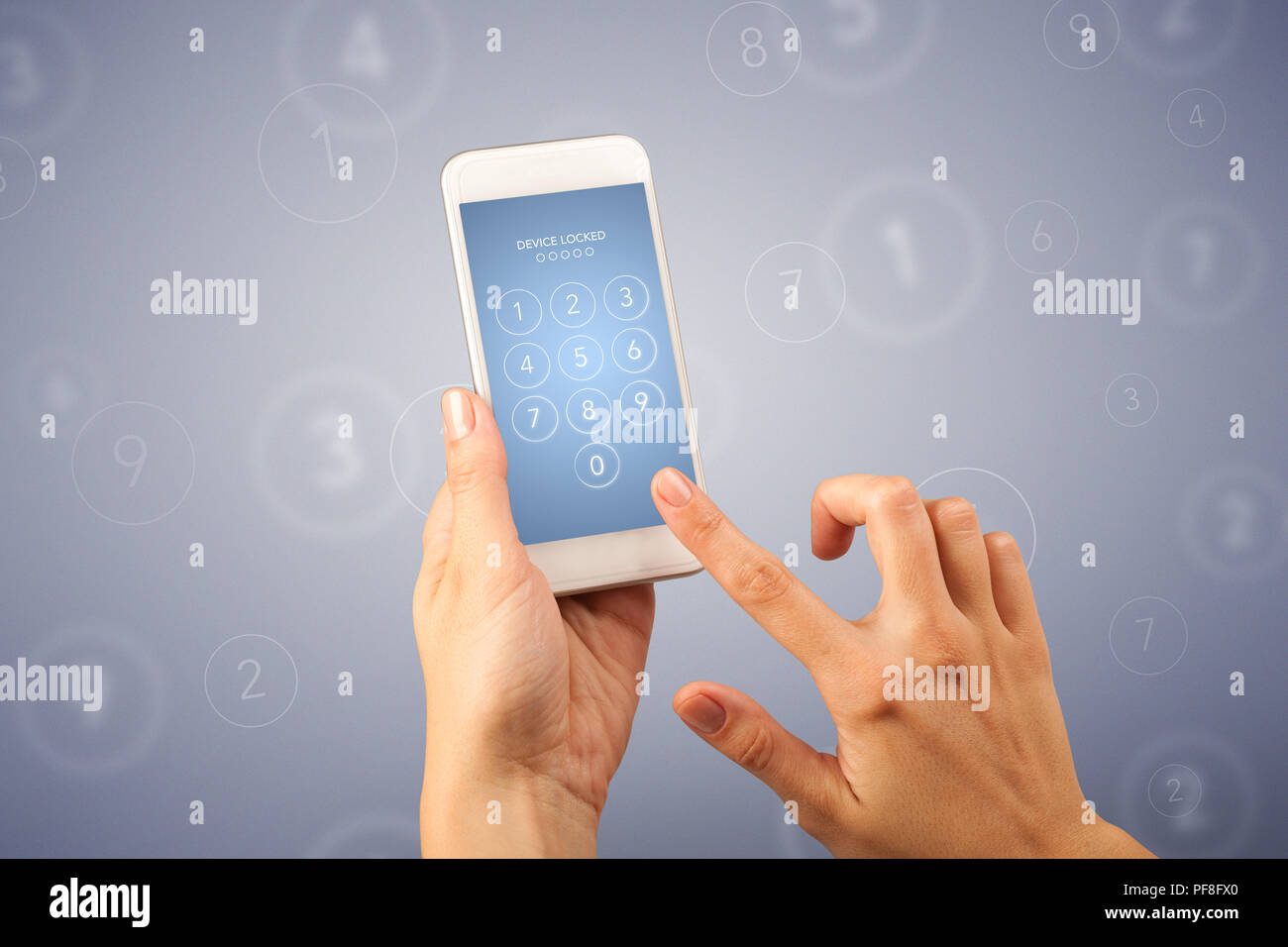 Female fingers touching smartphone with locked device requiring ...