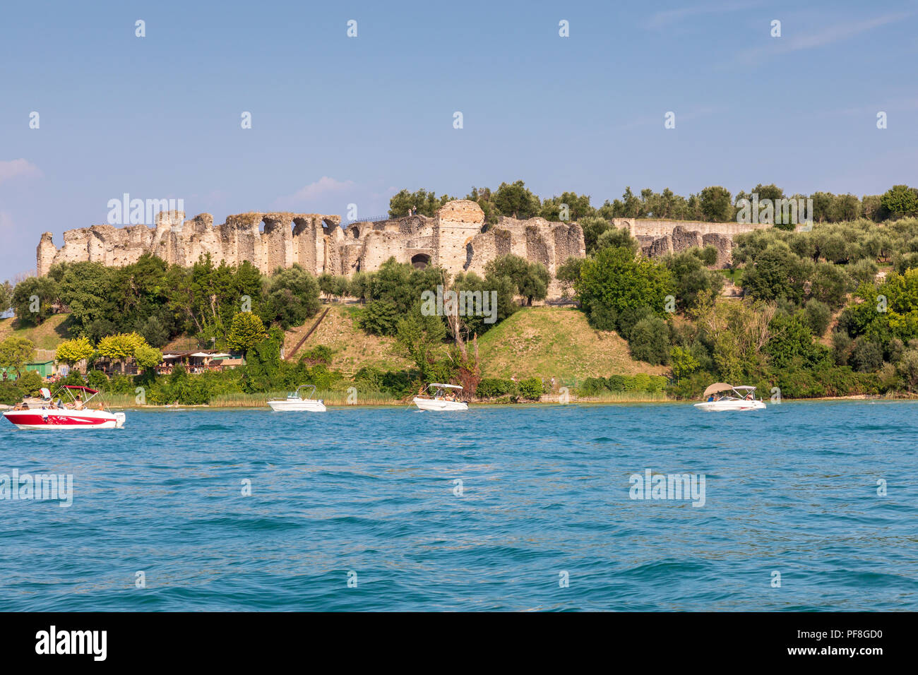 The Grotto of Catullo ruined Roman villas near Sirmione. Taken from Lake Garda. The Grottoes of Catullus Stock Photo