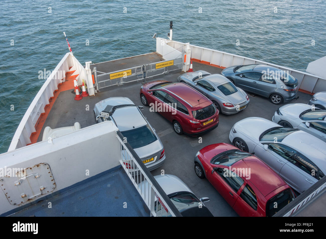 car ferry transporting vehicles across a body of water Stock Photo Alamy