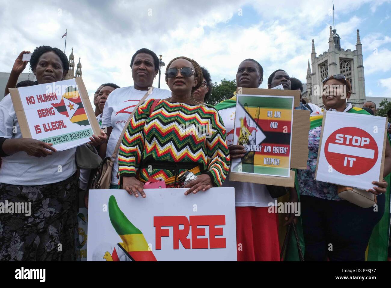 Zimbabewean protesters at Parliament Square calling on an end to falied asylum seekers being detained by the British government Stock Photo