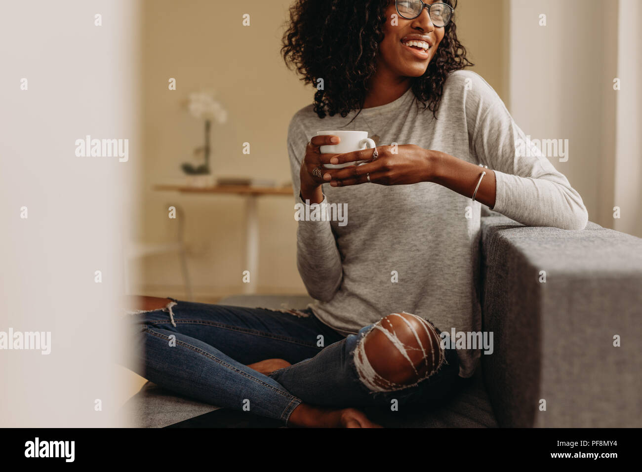 Woman sitting on loo hi-res stock photography and images - Alamy