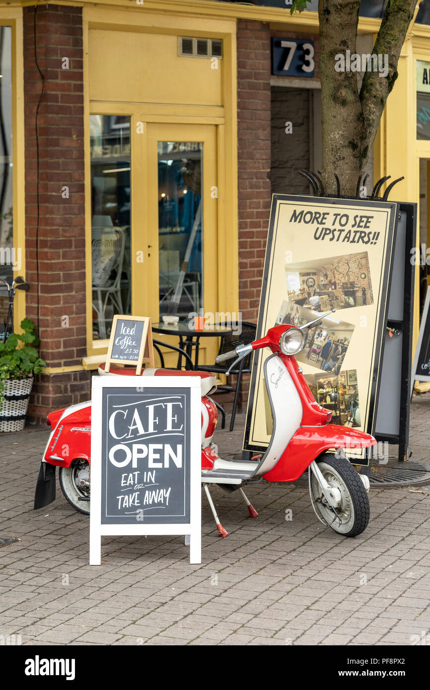 Cafe chalk board sign with Lambretta scooter Stock Photo