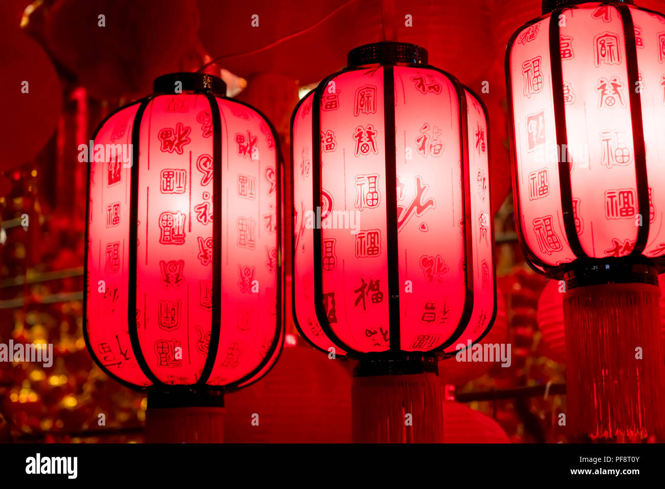 red lanterns with chinese letters printed. It brings good luck and ...