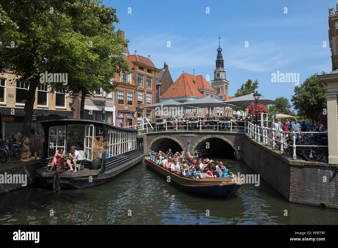 Alkmaar, Netherlands - July 20, 2018: Touristic sight seeing boat trip in the historical center of Alkmaar Stock Photo