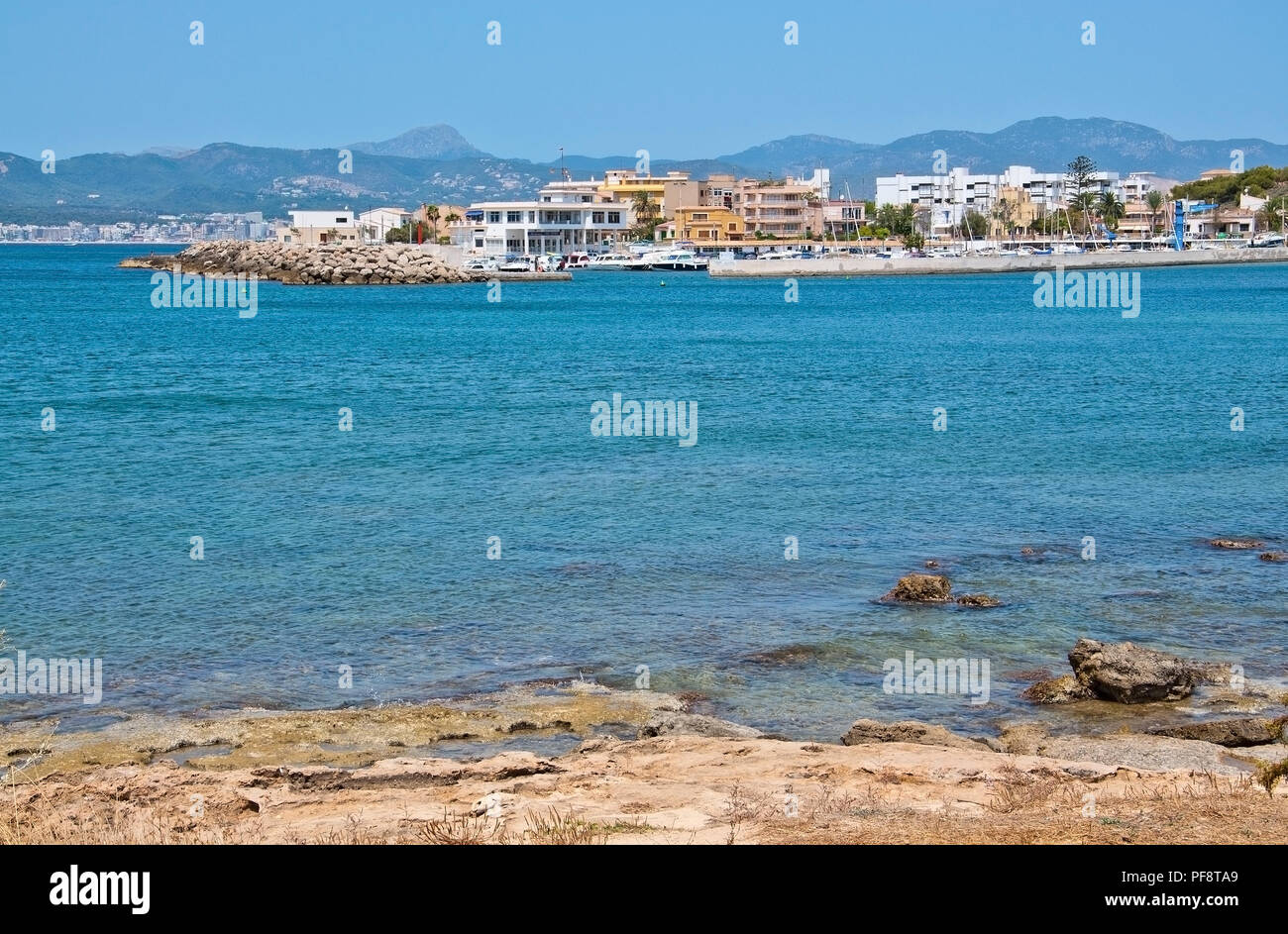 PALMA DE MALLORCA, SPAIN - JULY 21, 2012: Cala Gamba marina in rocky coastal landscape on July 21, 2012 in Mallorca, Spain. Stock Photo