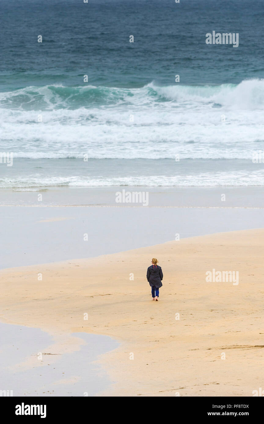 Woman walking windy hi-res stock photography and images - Alamy