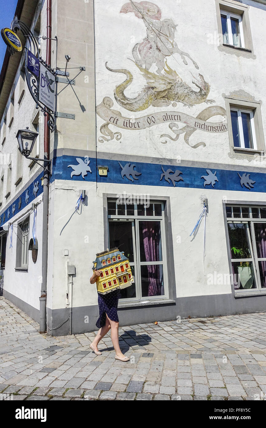 St. George kills the dragon on the facade, Furth im Wald, Bavaria, Germany Stock Photo