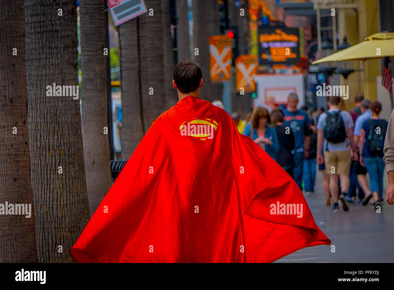 Los Angeles, California, USA, JUNE, 15, 2018: Outdoor view of unidentified man wearing a superman costume and walking in the streets of Los Angeles in Hollywood Stock Photo