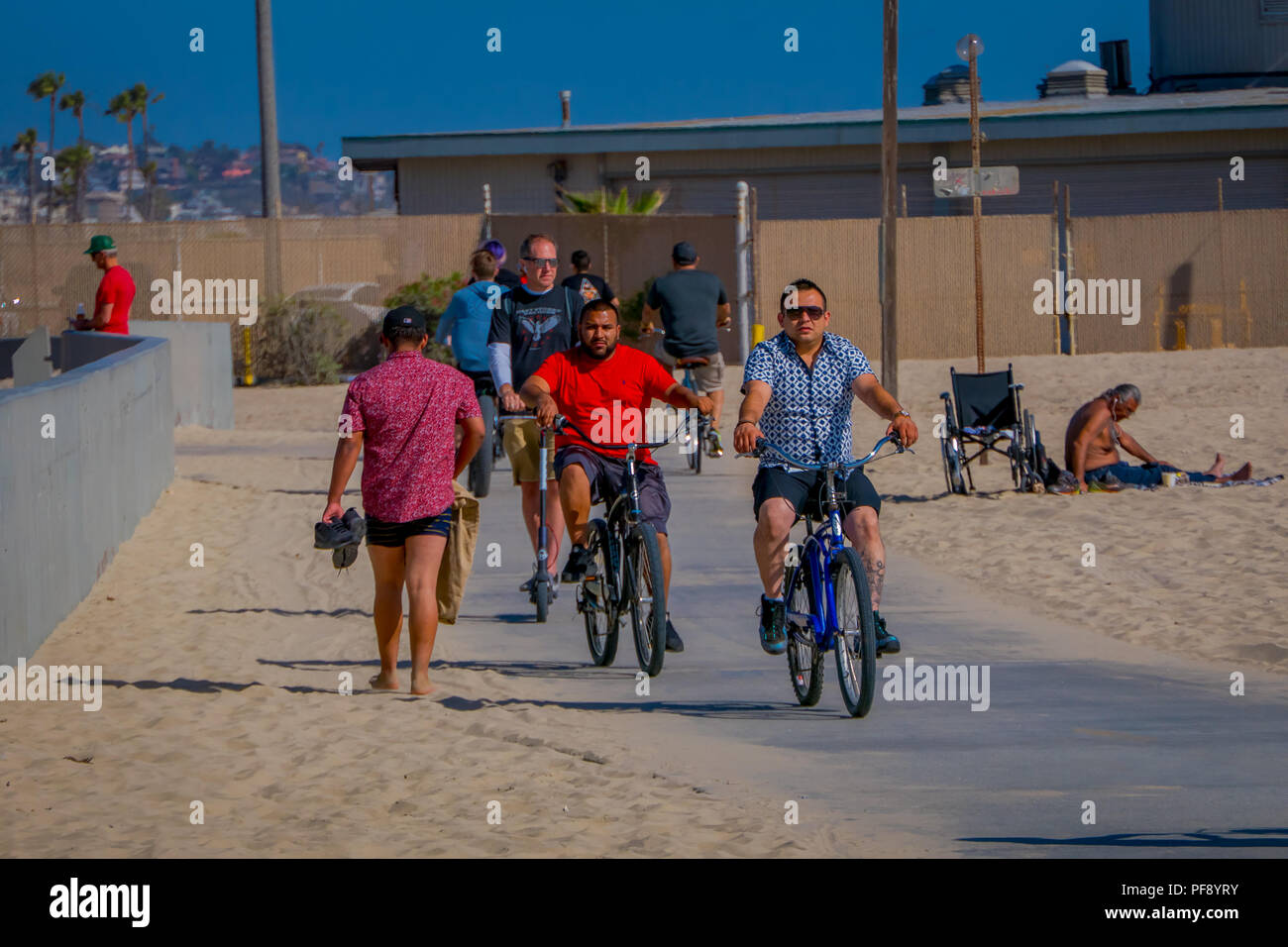 Los Angeles, California, USA, JUNE, 15, 2018: Outdoor view of unidentified people biking in Venice Beach in Santa Monica, is popular by domestic residents for relaxing Stock Photo