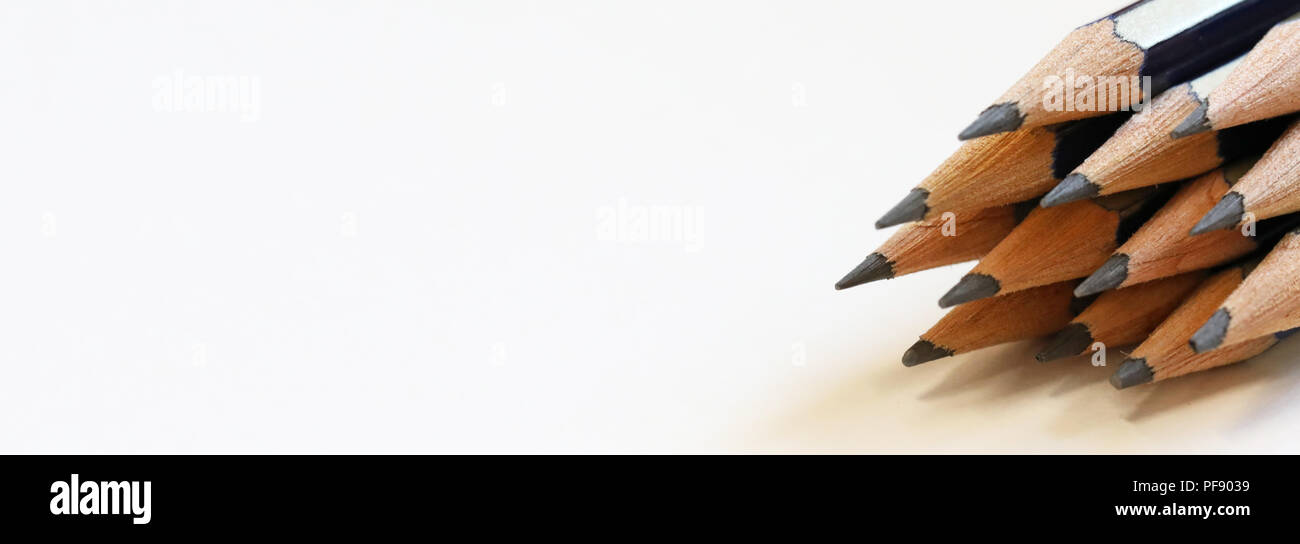 Arrangement of close up sharpened drawing writing graphite pencils