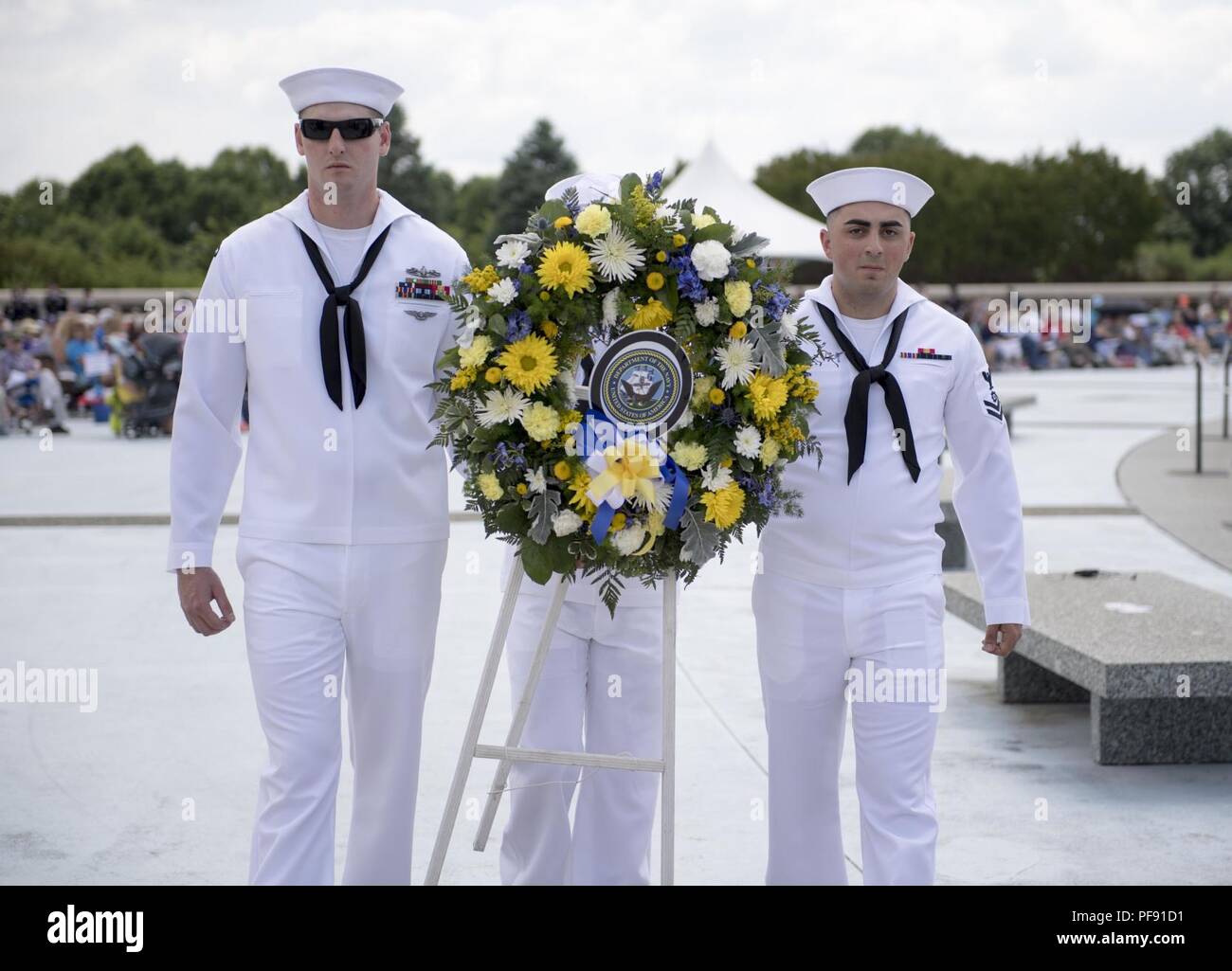Va.  (June 6, 2018) Sailors assigned to Assault Craft Unit (ACU) 2 present a wreath to be laid during the 74th D-Day commemoration ceremony at the National D-Day Memorial. The Memorial resides in Bedford, Va., the town that suffered the highest per-capita loss of lives in the D-Day invasion over any community in the allied forces. Stock Photo
