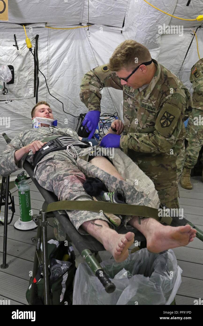 Spc. Benjamin Bassar, healthcare specialist, assigned to the 1171st