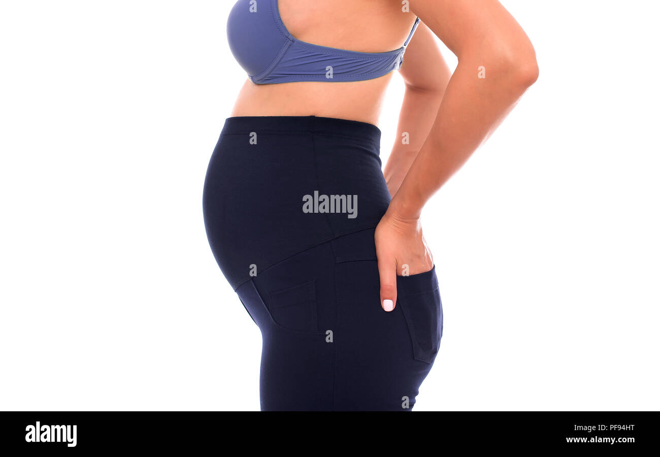 Pants for pregnant women. Special elastic band for the abdomen. Stock Photo