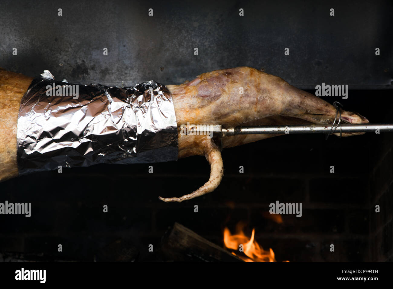 Traditional way of cooking a whole animal (lamb, goat) roasting an