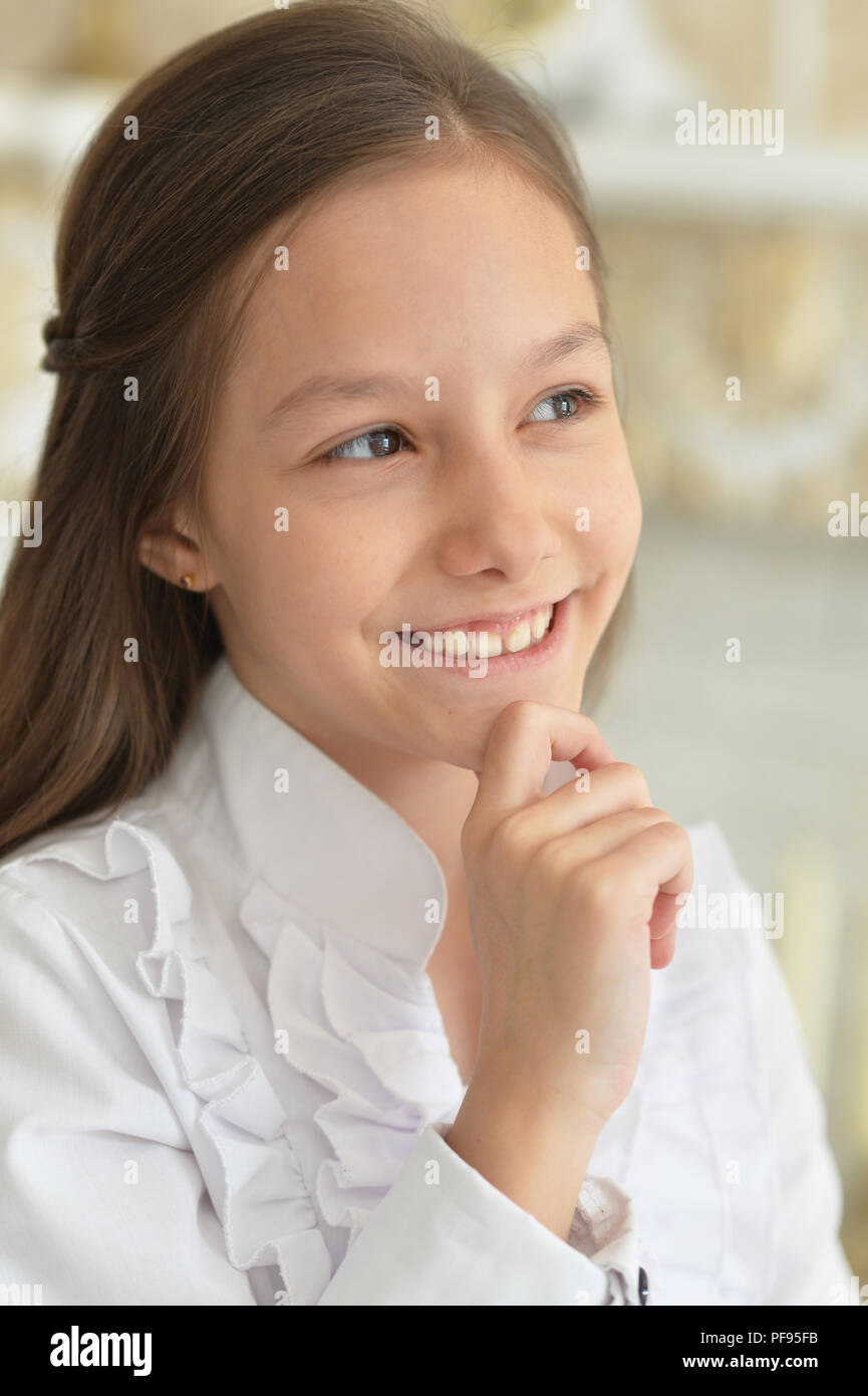 Portrait of emotional little girl in white blouse Stock Photo - Alamy