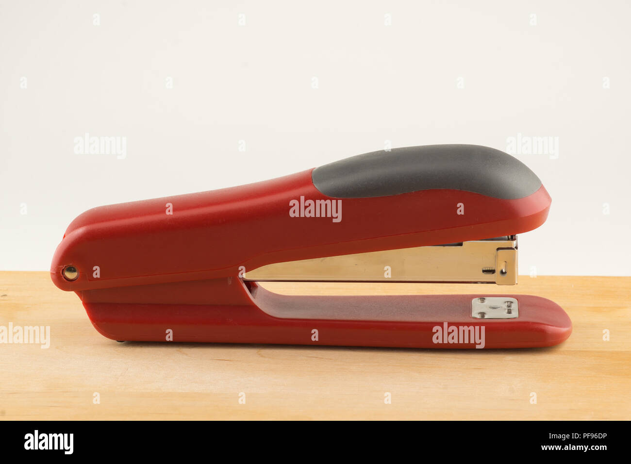 new stapler for stapling papers on a table Stock Photo Alamy