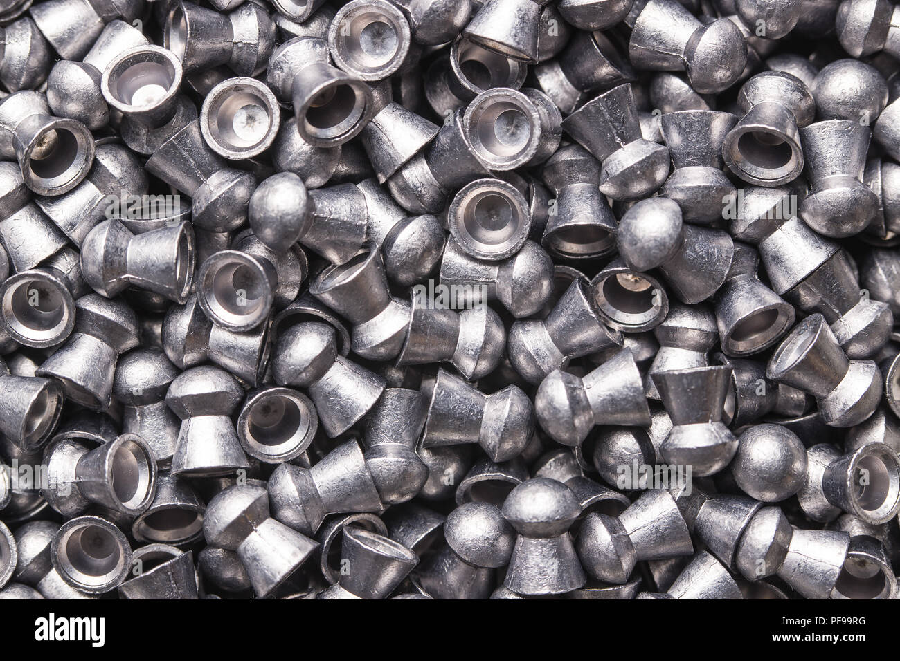 Texture of lead airgun pellets. Stock Photo