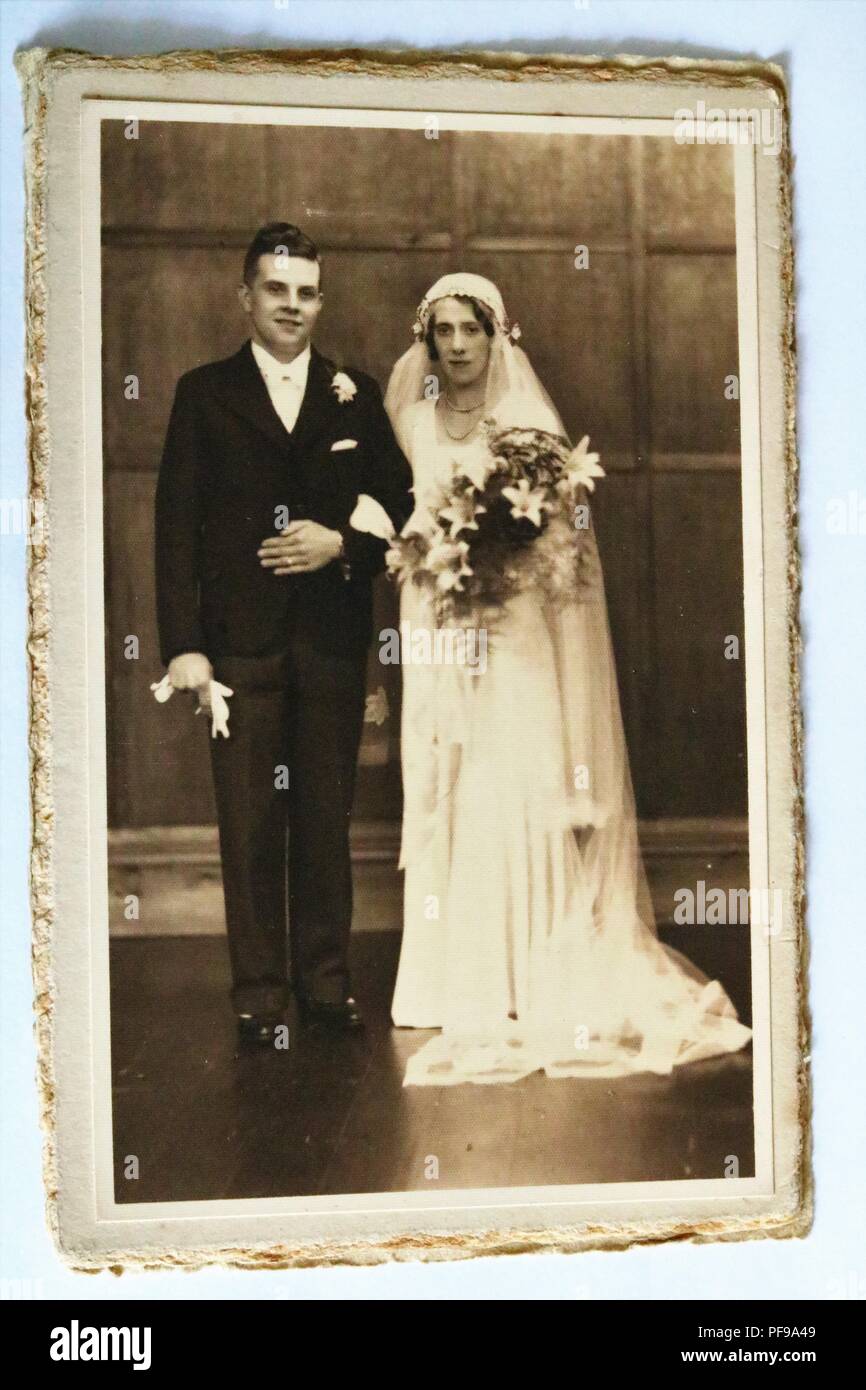 Social History - Black and white old photograph showing bride and groom at their wedding - 1934 Stock Photo