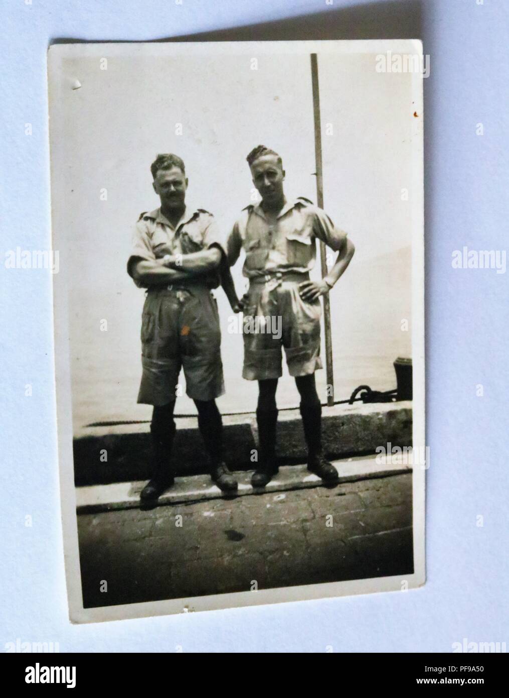 Social History - Black and white old photograph showing two men wearing shorts 1930s / 1940s Stock Photo