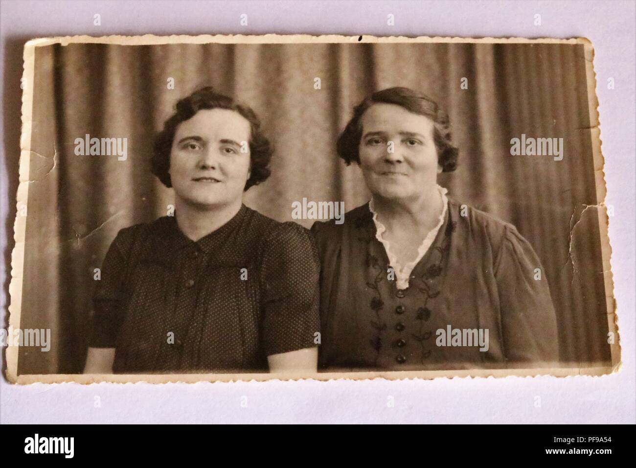 Social History - Black and white old photograph showing two women posing for portrait - 1930s / 1940s Stock Photo