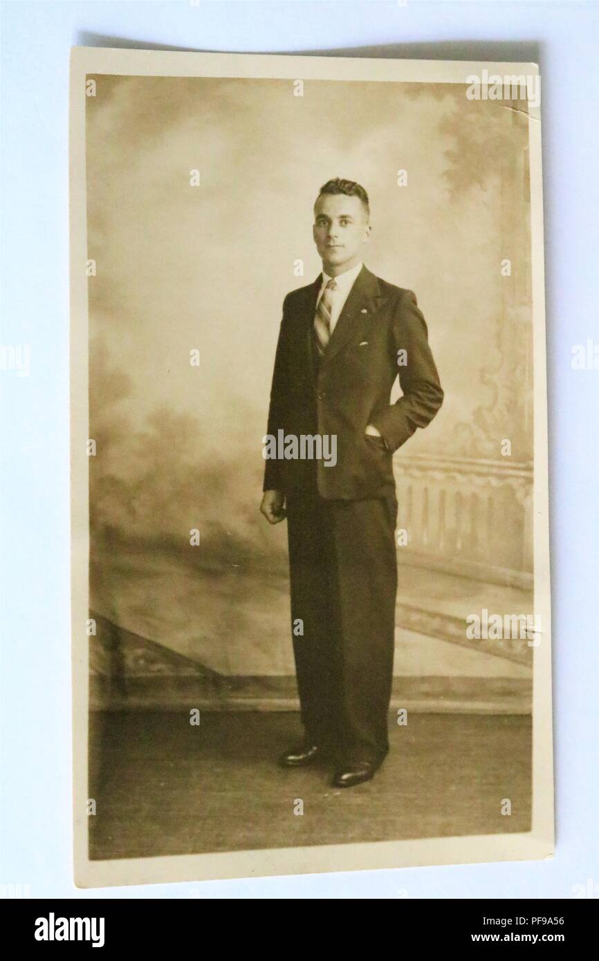 Social History - Black and white old photograph showing a handsome young man wearing a suit - 1930s / 1940s Stock Photo