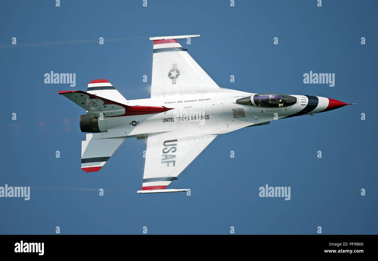 A F-16 Fighting Falcon with the U.S. Air Force Thunderbirds piloted by Major Whit Collins performs a high speed pass during the 2018 Chicago Air Show Stock Photo