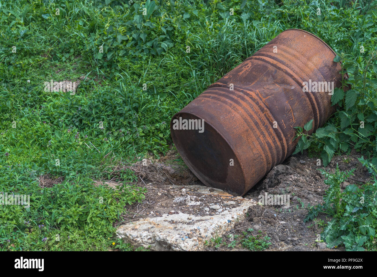 A burn and rusty petrol can Stock Photo - Alamy