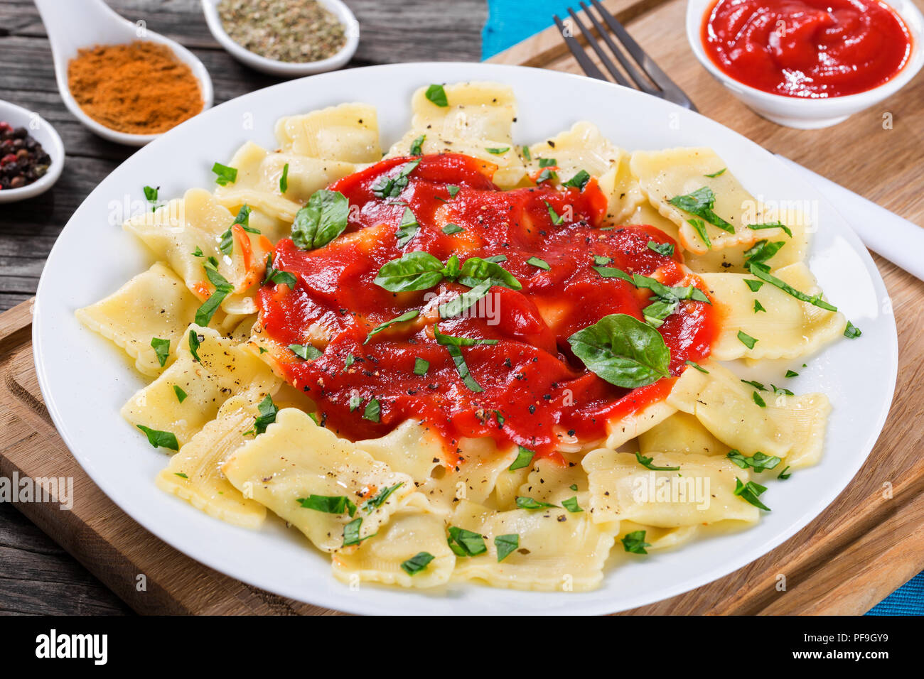 Italian ravioli filled with ricotta cheese and spinach with tomato