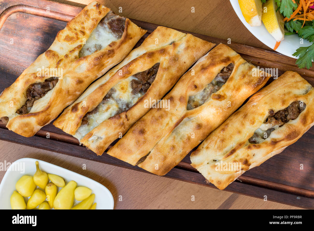 Turkish Bafra Pide with Minced Meat Kavurma. Traditional Food Stock Photo -  Alamy