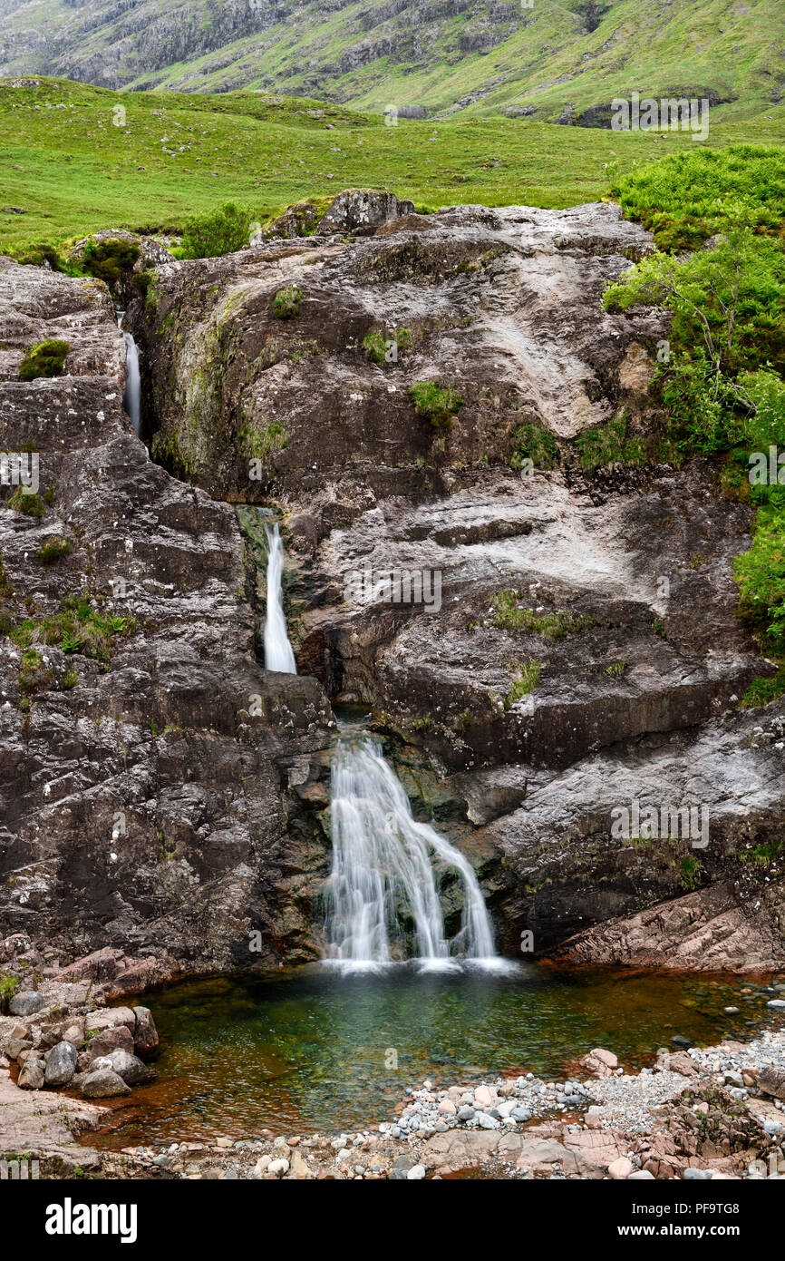 Falls of Glencoe waterfall at the Meeting of Three waters at the foot of Three Sisters mountains of Glen Coe Scottish Highlands Scotland Stock Photo