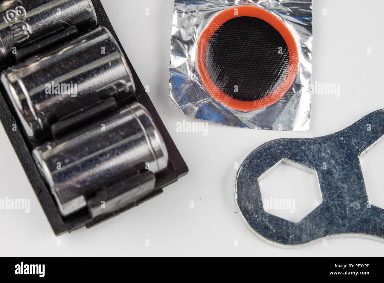 Bicycle tube, glue and patches in the Repairing a damaged